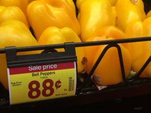 Yellow peppers with a price for 88 cents